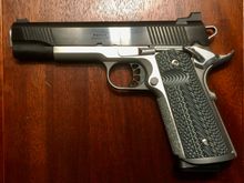 Springfield Ronin 9mm. Of all the ones posted, this is the only one I kept, and the least expensive.