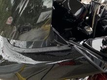 Not sure if it works inside the fairing, I run a Madstad windshield and have it attached between the windshields, doesn’t bother me at all