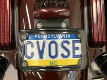 H-D black curved license plate frame on modified stock tail light 