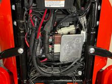 Ended up having to take out the factory cover that fits above the battery.  Gives me much more room.  And everything fits great.  Took some measurements and going to 3D print some caps for the terminals just to make sure nothing crosses them. 