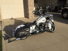 Rear is air ride system with 5' of travel. Can make it as comfy as I need and slam it when parked for looks.