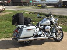 H-D rolling bag on the luggage rack and Saddlemen roll duffel on the passenger seat. 
