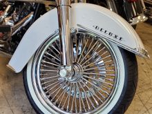 Went 18" x 3.5" tire is a continental as it was hard finding whitewalls in my choice of size. Chromed the lower forks and sliver braided all the wires i could. Hard to find chrome stuff to fit the 2017 forward deluxes.