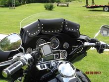 If you lift the fuel tank the convex bend helps clear the tank