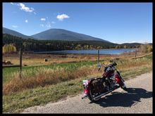 Ha Ha creek road and a small lake. Mt Baker in the background.