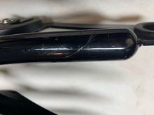 Scratched. Needs touch up.