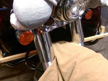 Hose clamped V-blocks to keep the drill aligned, as low as I could get them, canted outwards 15 degrees each.