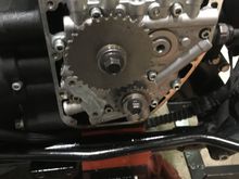 Install the cam gears without the chain, then place a straight edge against the sprockets, and try to insert the appropriate feeler gage in between the straight edge and the cam sprocket. Check SM for proper feeler gage. If you can fit it in between the two, you need to use a different cam spacer. The cam spacer kit isn't included in the 117 kit. When you measure this, set the timing marks so it's easier to install the gears when you get the chain on it.