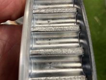 Very rough on many teeth and almost appear misshapen