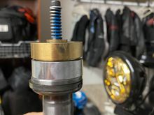 I guess that silver item is an Emulator adapter?