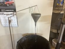 Made one from funnel and an old lamp. Also works to lubricate clutch and brake cable. 