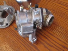 this carb LOOKS like an S&S but its missing all the raised lettering & logos !?!? cheep imitation ? . . .