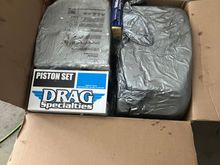 All packed. Pistons, rings, and hardware.