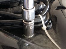 unbolting the 3 or 4 bolts holding the oil tank to the frame