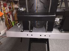 Front wheel crossbar.