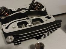 Had to modify a 13/16 spark plug socket to transfer the ACR's.  Worked like a charm.  These are CNC Screamin eagle heads with heavy duty valve springs. 