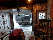 demolition and removal of old inferior insulation  at this point for years i worked with one outlet one bulb over head and no heat