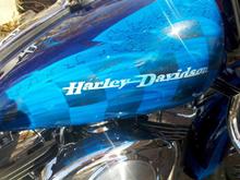 New paint. Side view of gas tank.