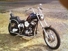 sat on this pan head when i was 7yrs.old.swore one day id make her mine.full stroked,added electric start open primary.although must keep a gas can in duffle bag hidden we travel far.will show better pics soon gsa tank was painted red,white blue flaes,unshiny to show her age 55.