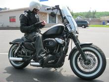 Nightster with Fat Bob front end and 16 inch wheels, black fenders.