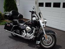 Henry -
09 Road King - basic black w/cruise control, Heritage style bars, Sundowner, Tourpak w/wrap around backrest and a few other goodies