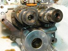 Here is pic of cam support plate with the old cams ready for swapping. Rear chain tensioner is at top, oil pump is at bottom.