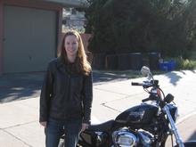 My wife giving me a half smile. She was a little curious why in the hell I wanted a picture of her with blown out helmet hair fresh after a ride. She hates these pictures of her. I promised I wouldn't post them on the internet. HA!