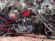 Electric start batteries were so unreliable I retrofitted a kick start. The seat back was made so a removable sissy bar could be slid in or removed. I made the fender strut and installed it in such a way as to carry the line up to sissy bar.