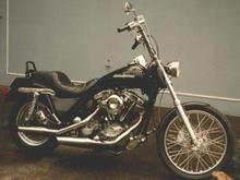 1982 FXRS. Was a mess when I bought it, but it had an S&amp;S 93-inch stroker. I put a 39mm wide glide conversion on it, a swap meet seat, new wheels, Cycle Shack pipes, a new headlight, tacked some emblem mounts on the tank, powder coated the tin, and rattle-canned some Ness side covers, and I got all sorts of compliments. Sold it for megabux.