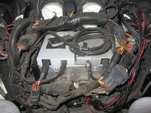 Stock HD radio with both iPod and CB modules. Also in the picture is an Apple iPod Nano connected to the iPod module.