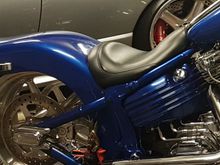 I couldn't find a seat that looked good so I chopped up original plastic rocker seat pan and reshaped original foam then had it retrimed for $150, looks like a bare bones seat.