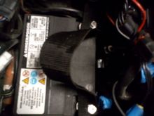 Read somewhere that someone had trouble getting the battery out of his Ultra.  My factory strap was dry rotted and this worked like a charm.