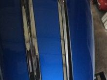 CENTER CONSOLE, MY PAINTER DOING SOMETHING THERE AS WELL, AS THAT BLACK BREAKOUT SPLASH GAURD IN REAR TIRE AREAM, ITS A SURPRISE TO ME, HE SAID YOU WANT CUSTOM, LOL