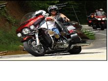 The Wife n I burning a corner on the Tail of the Dragon this Summer... It's fun but I rarely got out of second gear. I prefer the big sweeps on the 3 Sisters in Bandera Tx... No Wobble on that turn...