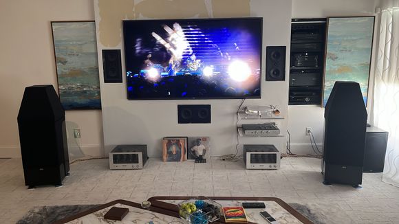 I spin records about an hour an evening. Sometimes like in this picture I turn the TV on without sound with band live performances.. or Vintage motorcycle racing.