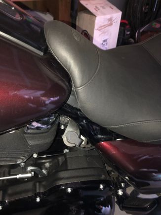 Wired plug direct to battery, bracket screws into tapped hole for wind deflectors on frame down tubes. It can be removed easy enough once spring arrives.