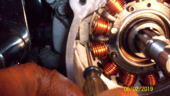 New retainer in place. Captain Dave suggests blue Lock-Tite on the screws.