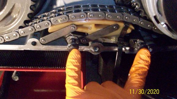 Replacing the automatic tensioner bolts. I used blue Loctite on the threads. Don't forget the spacers between the tensioner and the primary case!