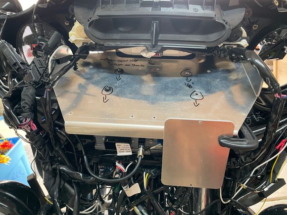 Slight adjustments needed.  Whole thing needs to come forward about 1/8", and I missed on the speaker pod holes on left and right.  Will remake plate today.
Idea to have DSP mount on front flange works real well.  Should keep wiring clutter to a minimum.
