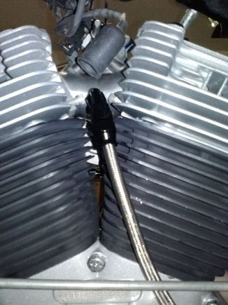 -6 elbow and hose which goes to a Krank Vent under the motor