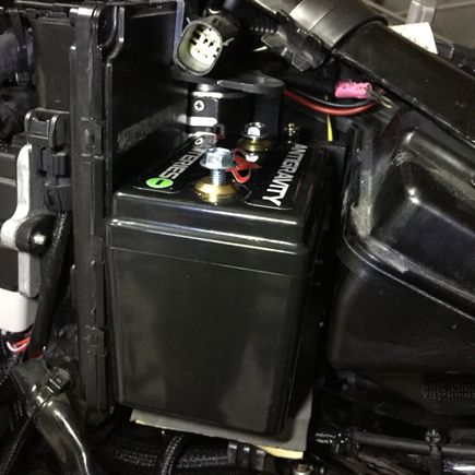 Lithium battery used to create space for compressor.