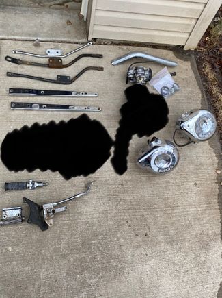 Carbs/air cleaners - exhaust brackets - FLH fender struts - crossover shield - mid control rear brake pedal