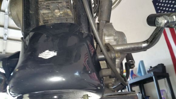 Position the spoiler to the front of the frame.