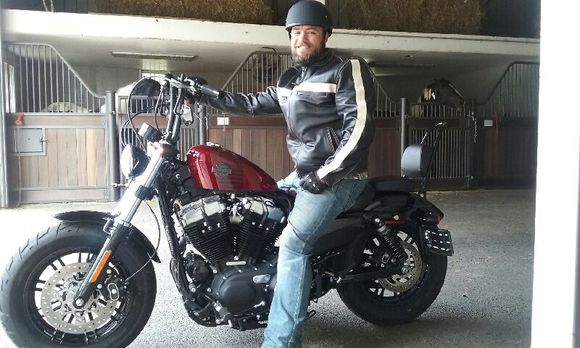 As you can see in the pic, i dont have to lean forward hardly at all. I have a bad back and the drag bars were iut of the question. These bars were on my bike on the showroom floir so in not sure exactly what brand they are but they are comfy and look great in my opinion.