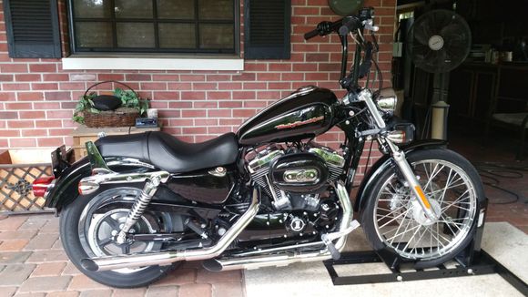 New bars, tank lift, coil/ignition relocation