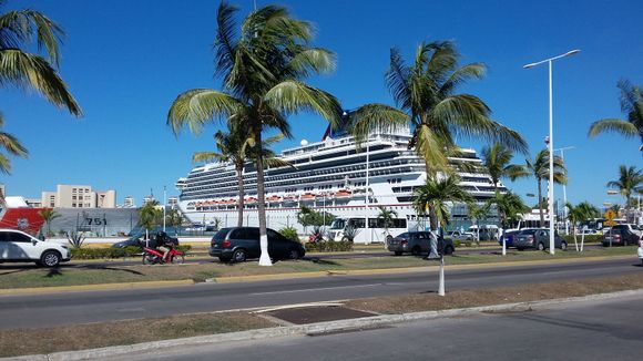 A cruise ship in port at the bus transfer point.