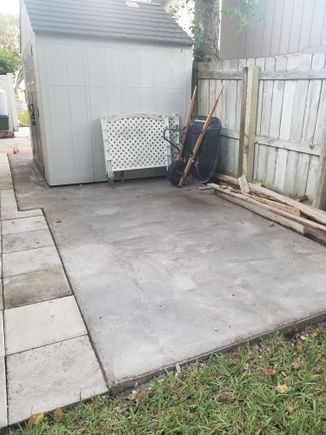 The existing Shed before being moved up toward the grass.