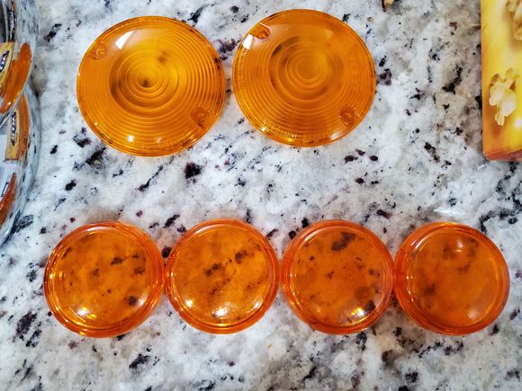 The larger orange lens covers say Harley Davidson on them