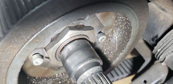 Walked race...dremel? Brass punch? Welding metal onto the race to use puller? Or opening right side of the transmission to loosen the gears a bit?