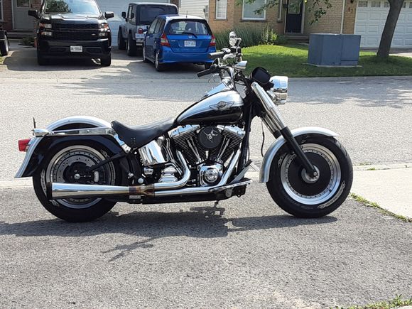 I think a small quarter fairing in silver with a black chin spoiler will complete the look...